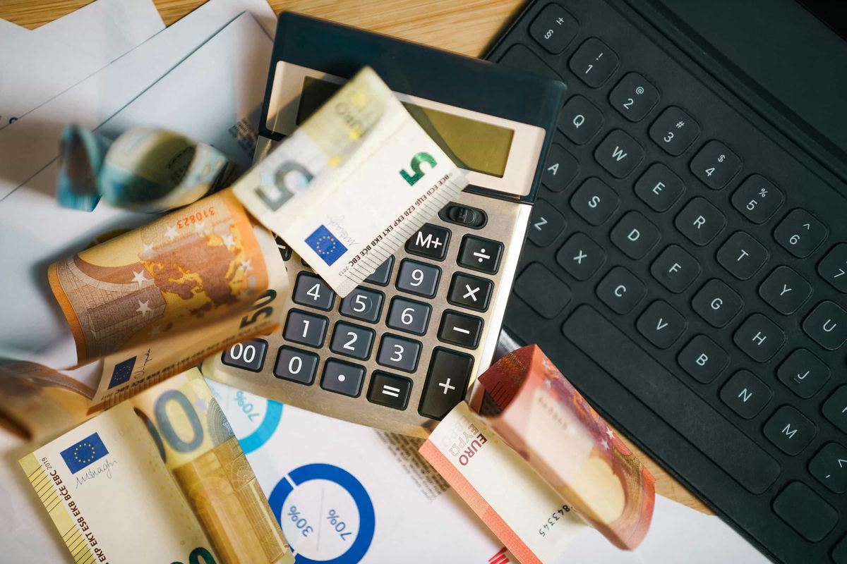 Calculator on a pile of money